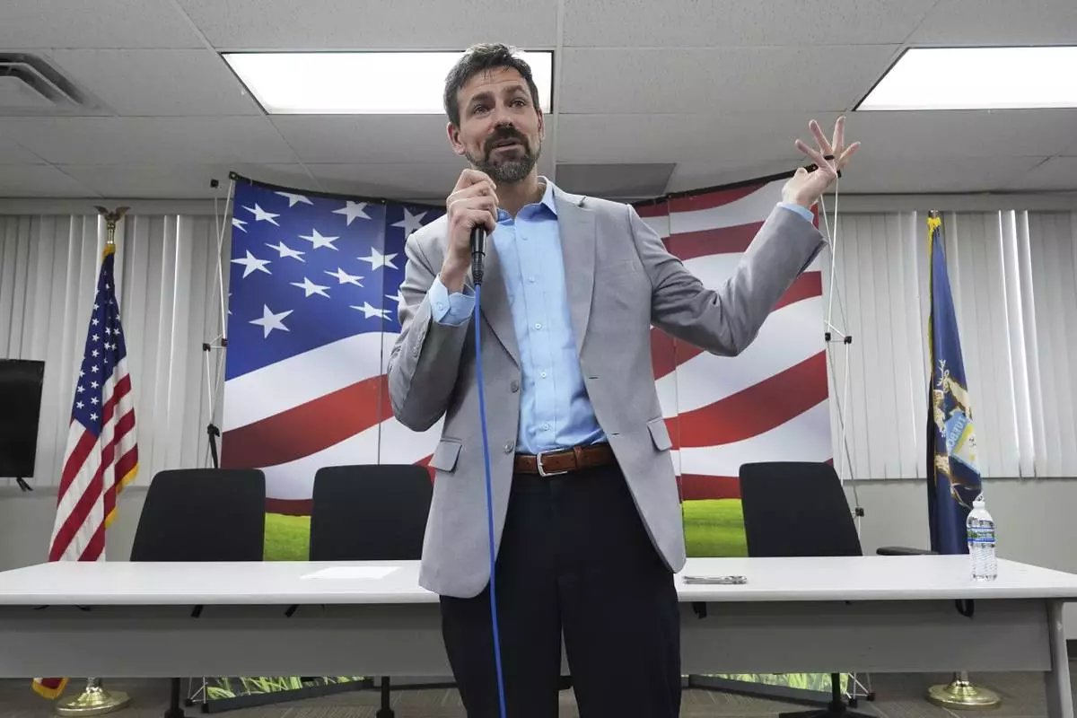 Ryan Kelley speaks at the Jackson County Republican headquarters, Thursday, April 10, 2025, in Jackson, Mich. (AP Photo/Paul Sancya)