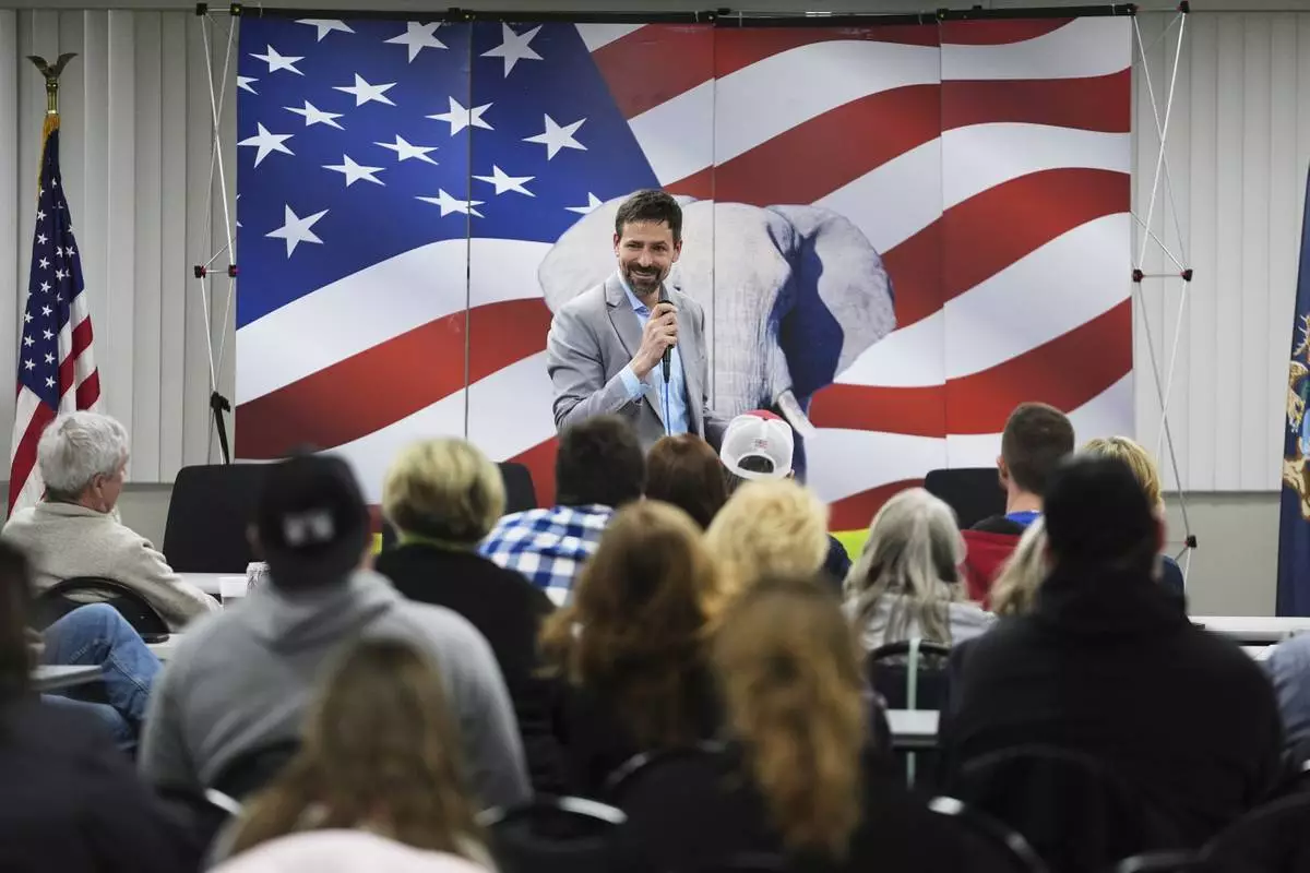 Ryan Kelley speaks at the Jackson County Republican headquarters, Thursday, April 10, 2025, in Jackson, Mich. (AP Photo/Paul Sancya)