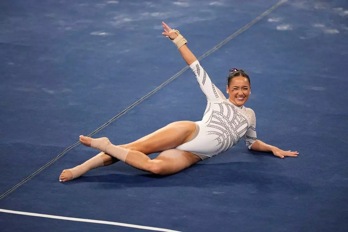 FILE - LSU's Aleah Finnegan competes on the floor exercise during the NCAA women's gymnastics championships in Fort Worth, Texas, April 20, 2024. (AP Photo/Tony Gutierrez, File)