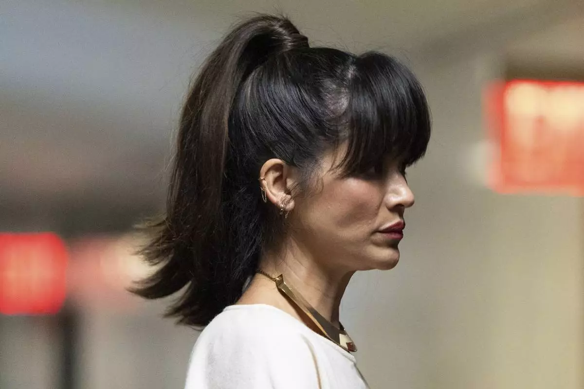 Tarale Wulff enters court following a break during Harvey Weinstein's retrial at Manhattan criminal court, Wednesday, April 23, 2025, in New York. (AP Photo/Julia Demaree Nikhinson)