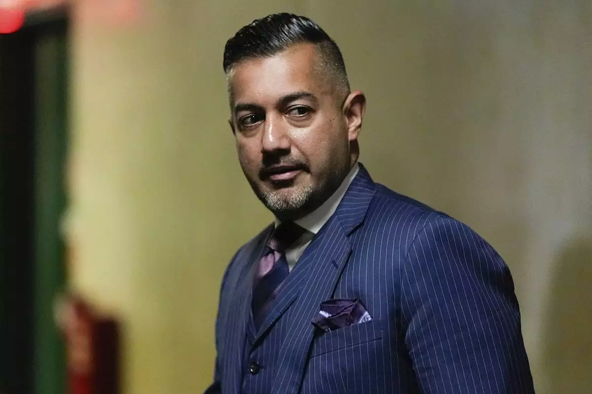 Attorney Imran Ansari leaves court for a break during Harvey Weinstein's retrial at Manhattan criminal court, Wednesday, April 23, 2025, in New York. (AP Photo/Julia Demaree Nikhinson)