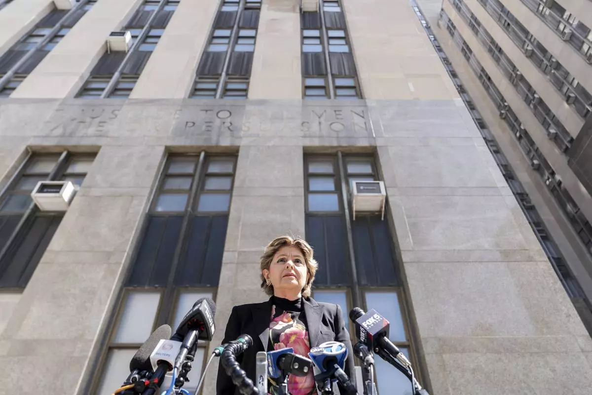 Attorney Gloria Allred speaks to reporters outside Manhattan criminal court during a break in Harvey Weinstein's retrial, Wednesday, April 23, 2025, in New York. (AP Photo/Julia Demaree Nikhinson)