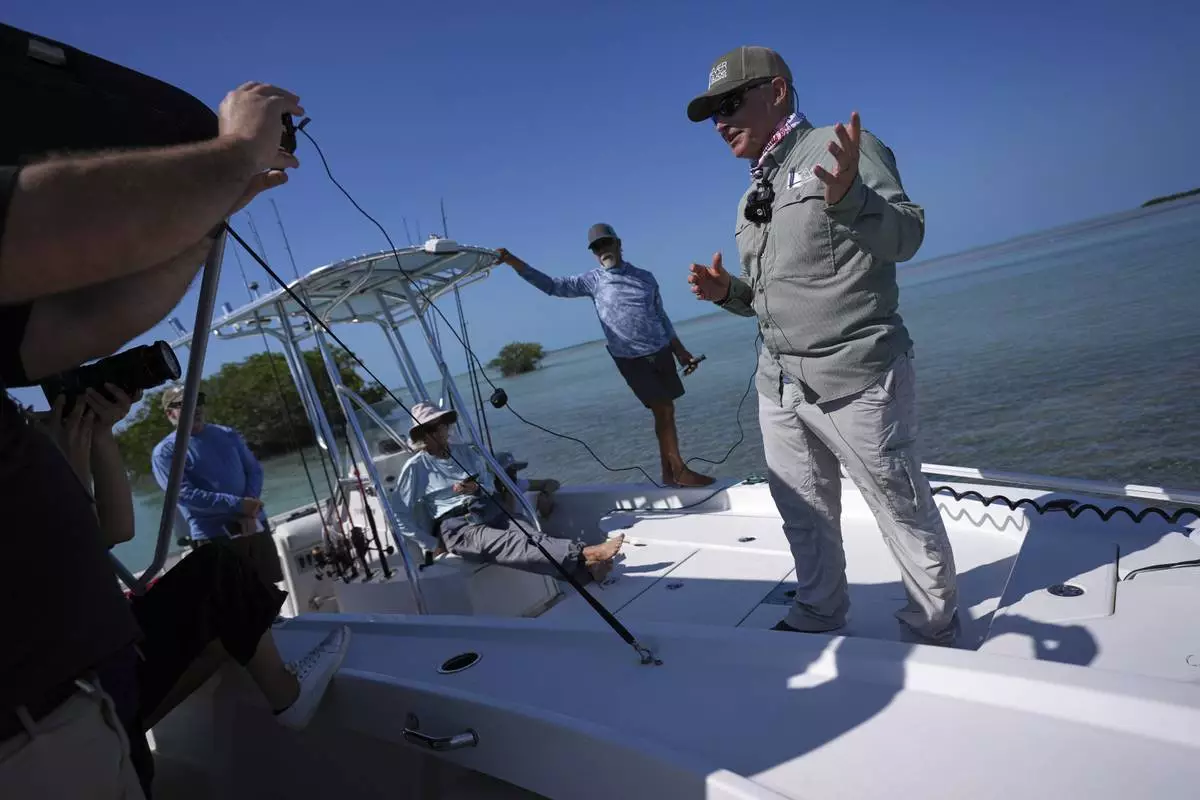 Steve Davis, chief science officer with The Everglades Foundation, talks to journalists during a media visit to Florida Bay organized by The Everglades Foundation, near Islamorada, Fla., Monday, April 7, 2025. (AP Photo/Rebecca Blackwell)