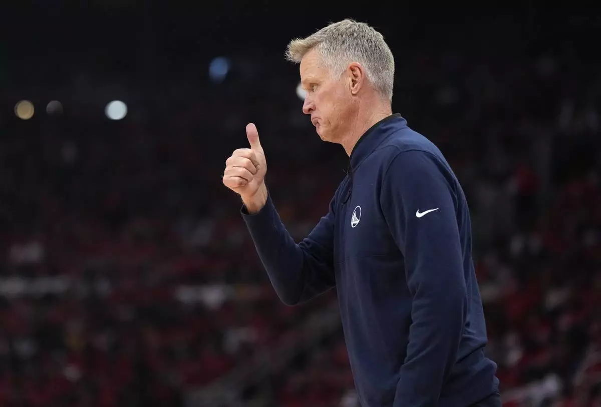 Golden State Warriors head coach Steve Kerr instructs on the sideline during the first half of Game 2 of an NBA basketball first-round playoff series against the Houston Rockets in Houston, Wednesday, April 23, 2025. (AP Photo/Karen Warren)