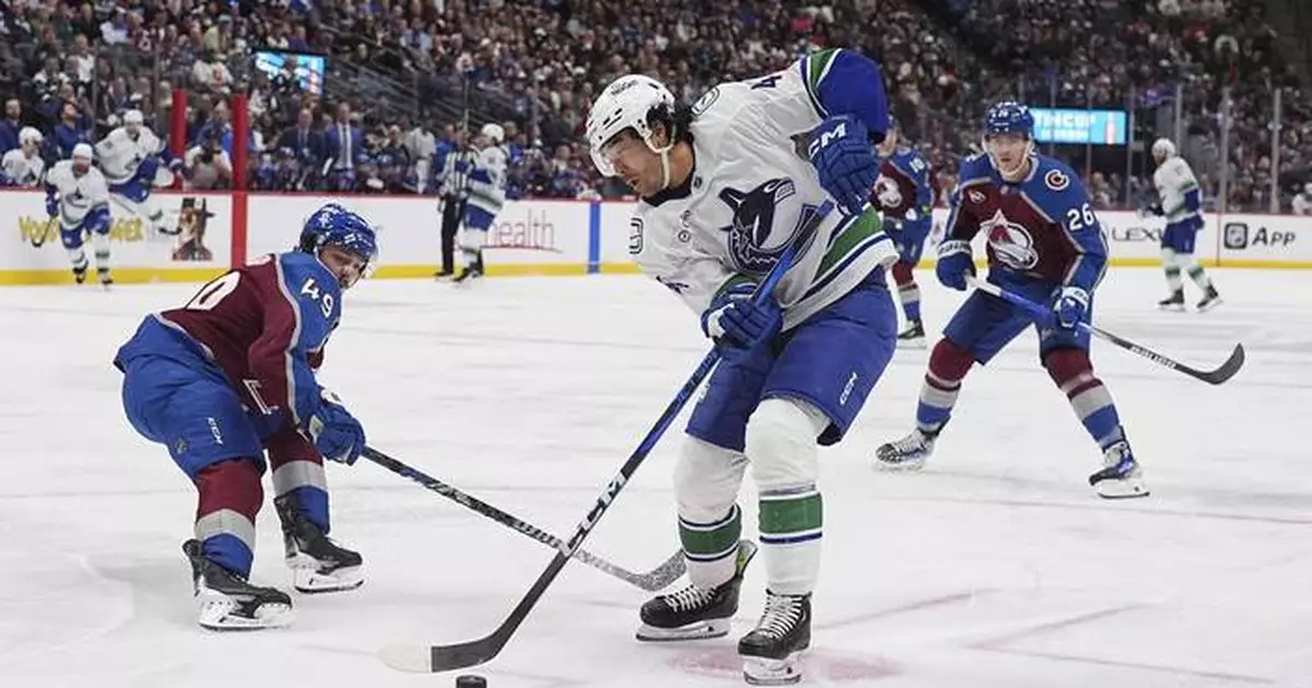 Sherwood and Joshua help Canucks win 4-1 in Avalanche's last regular-season home game