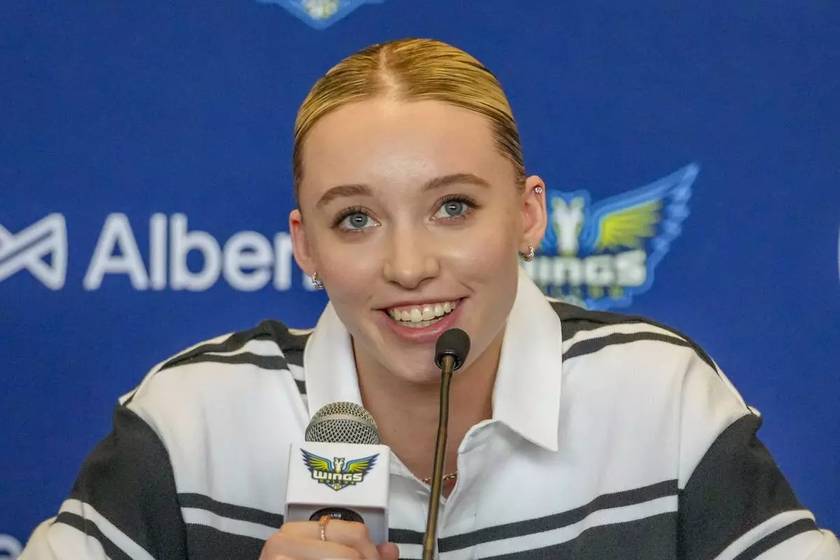 Dallas Wings' Paige Bueckers, selected No. 1 overall in the WNBA basketball draft, speaks during an introductory press conference Wednesday, April 23, 2025, in Dallas. (AP Photo/Julio Cortez)