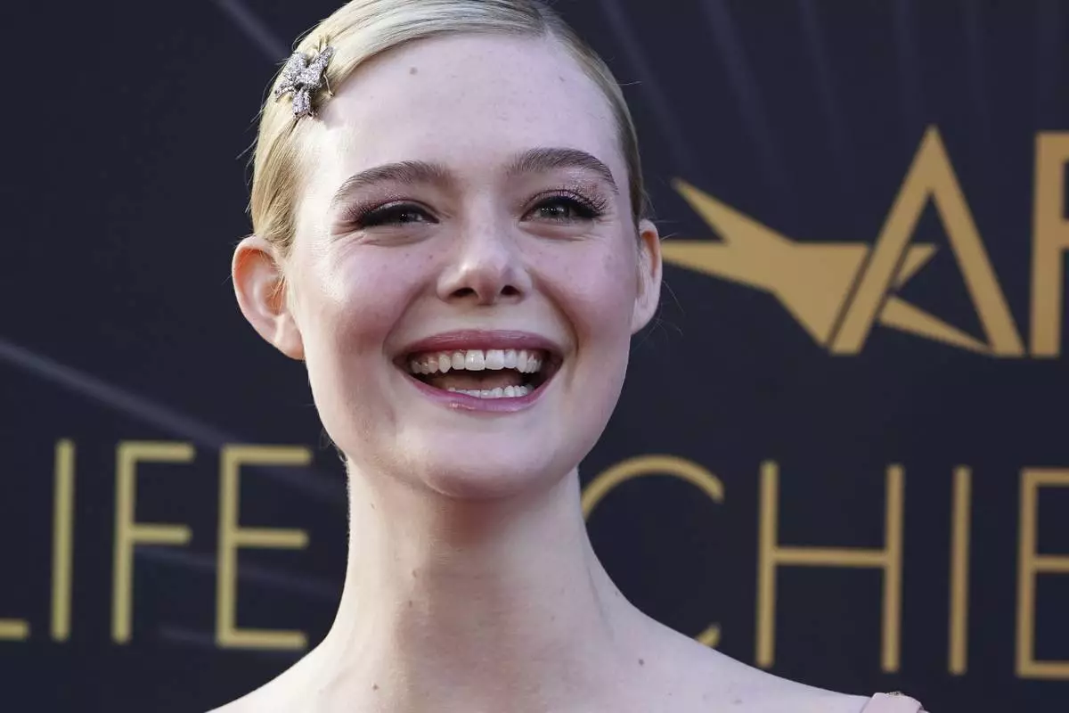 Elle Fanning arrives at the 50th AFI Life Achievement Award tribute to Francis Ford Coppola on Saturday, April 26, 2025, at the Dolby Theatre in Los Angeles. (Photo by Jordan Strauss/Invision/AP)