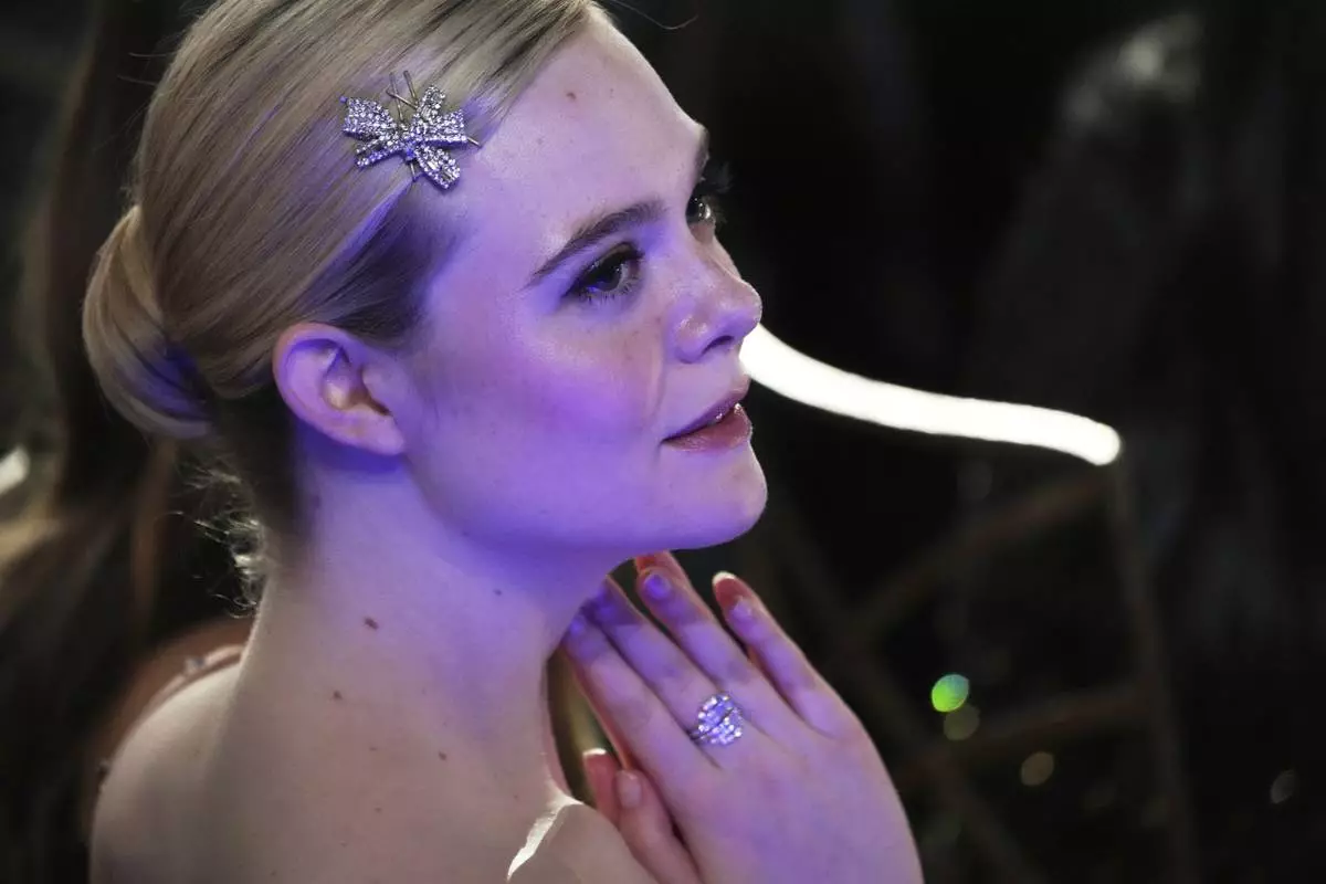 Actor Elle Fanning listens in the audience during the 50th AFI Life Achievement Award tribute to Francis Ford Coppola on Saturday, April 26, 2025, at the Dolby Theatre in Los Angeles. (AP Photo/Chris Pizzello)