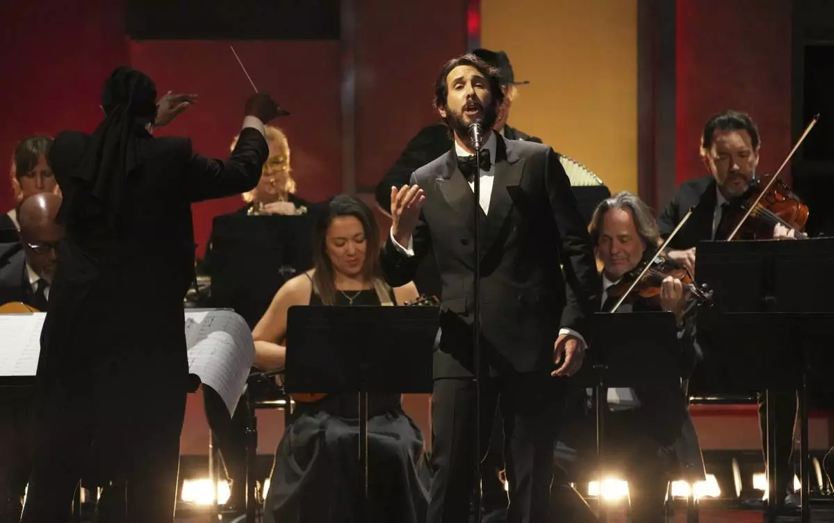 Singer Josh Groban performs with an orchestra during the 50th AFI Life Achievement Award tribute to Francis Ford Coppola on Saturday, April 26, 2025, at the Dolby Theatre in Los Angeles. (AP Photo/Chris Pizzello)