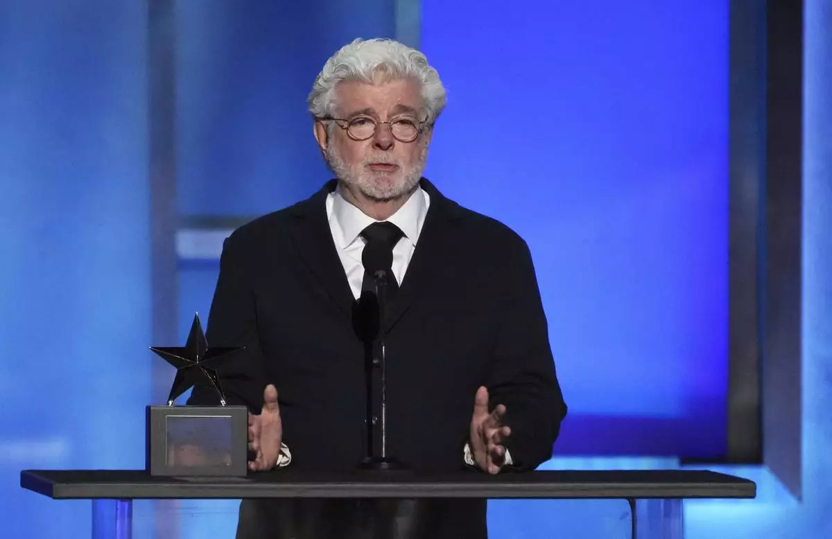 Filmmaker George Lucas speaks from the stage during the 50th AFI Life Achievement Award tribute to Francis Ford Coppola on Saturday, April 26, 2025, at the Dolby Theatre in Los Angeles. (AP Photo/Chris Pizzello)
