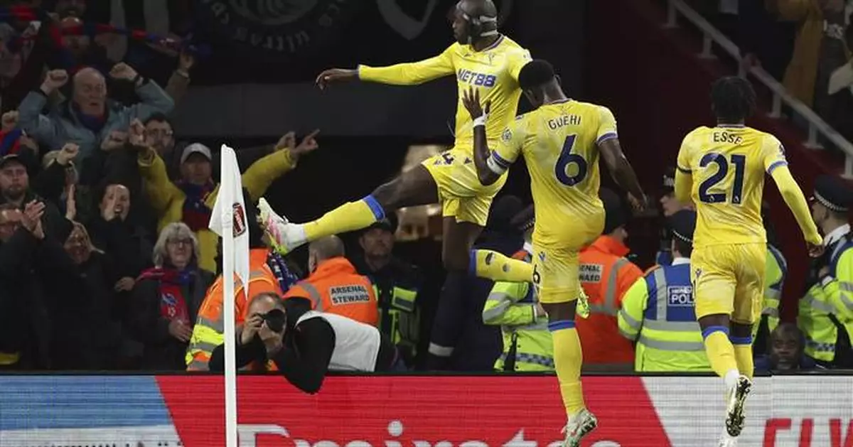 Liverpool must wait to clinch Premier League title after Arsenal draws with Palace