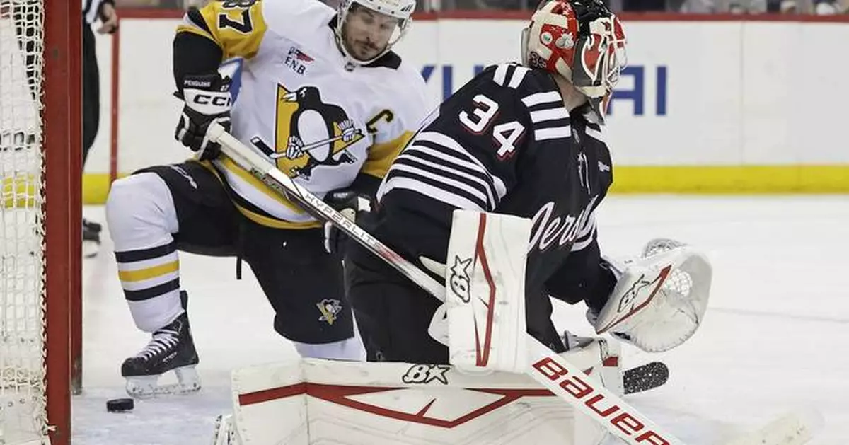 Crosby, Malkin help Penguins rally from 2 goals down to beat Devils 4-2