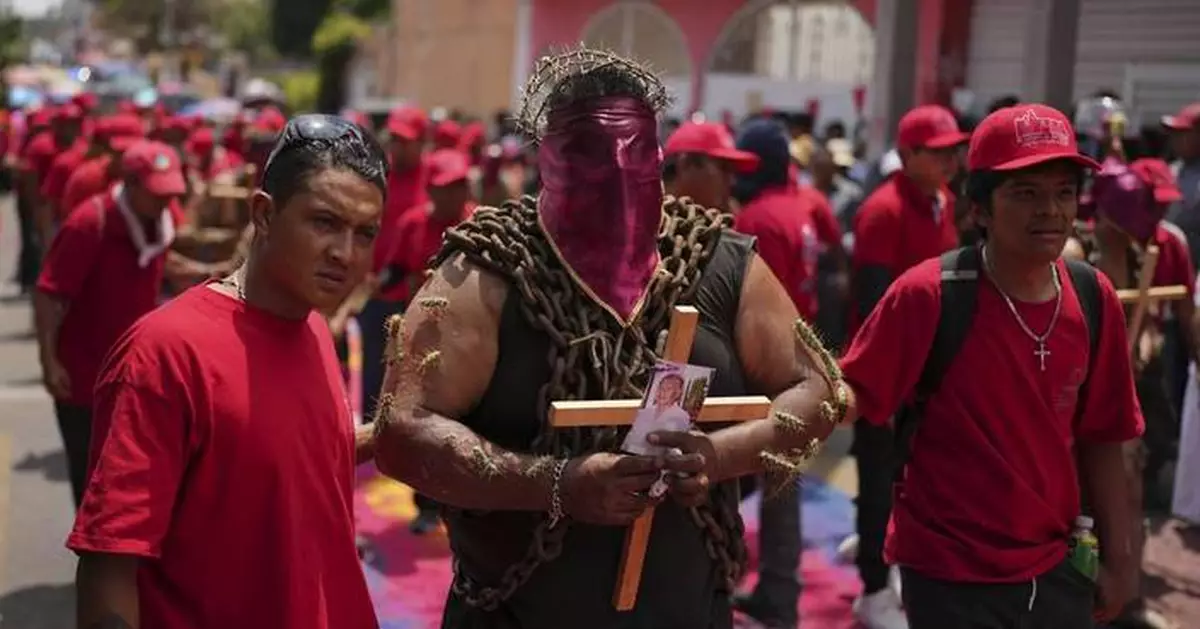 Men toting chains and pierced with cactus keep a Good Friday tradition in Atlixco, Mexico