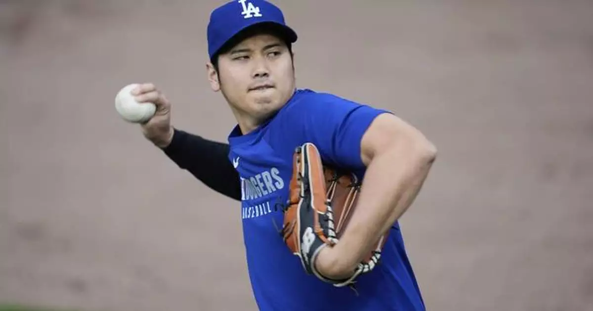 Dodgers star Shohei Ohtani plays catch as he continues his comeback from elbow surgery