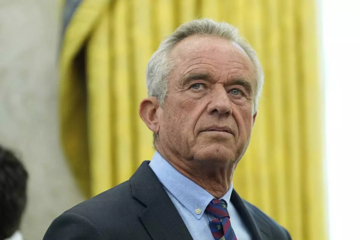 Health and Human Services Secretary Robert F. Kennedy Jr. attends a swearing in ceremony for Dr. Mehmet Oz to be Administrator of the Centers for Medicare and Medicaid Services, in the Oval Office of the White House, Friday, April 18, 2025, in Washington. (AP Photo/Alex Brandon)