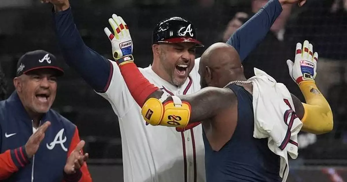 Marcell Ozuna homers in 11th inning to lift the Braves past the Phillies, 4-2