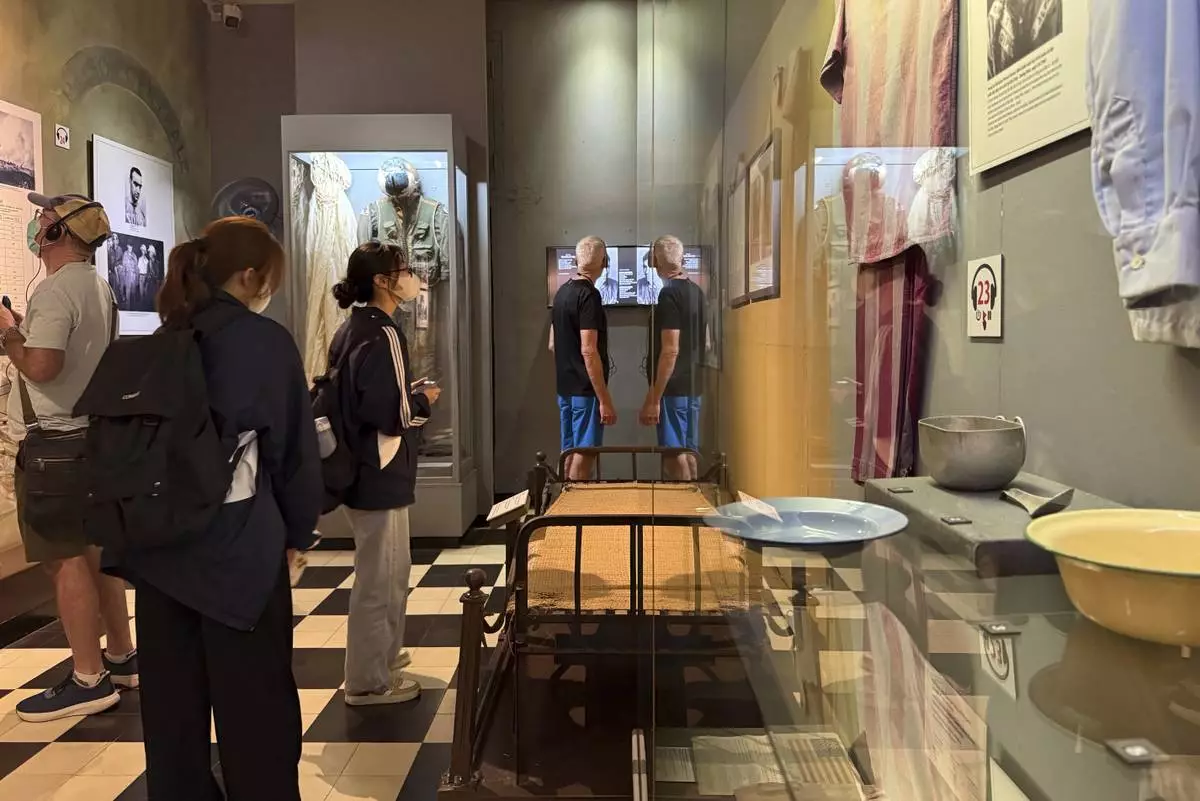 Tourists visit Hoa Lo prison museum in Hanoi, Vietnam, March 26, 2025. (AP Photo/Hau Dinh)