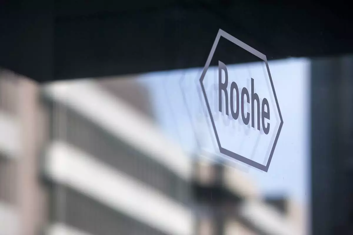 FILE - The logo of the pharmaceutical company Roche pictured in Basel, Switzerland, on Feb. 1, 2017. (Alexandra Wey/Keystone via AP, File)