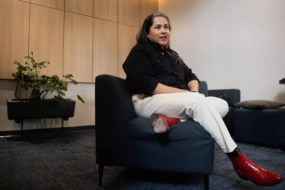 Mexican corridos singer Vivir Quintana gives an interview before performing her new album, about violence against women, in Mexico City, Wednesday, April 23, 2025. (AP Photo/Aurea Del Rosario)