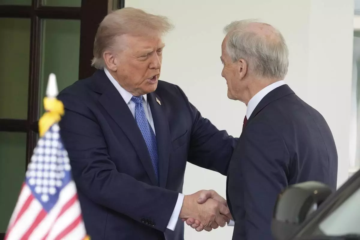 President Donald Trump greets Norwegian Prime Minister Jonas Gahr Støre, upon his arrival at the White House, Thursday, April 24, 2025, in Washington. (AP Photo/Alex Brandon)