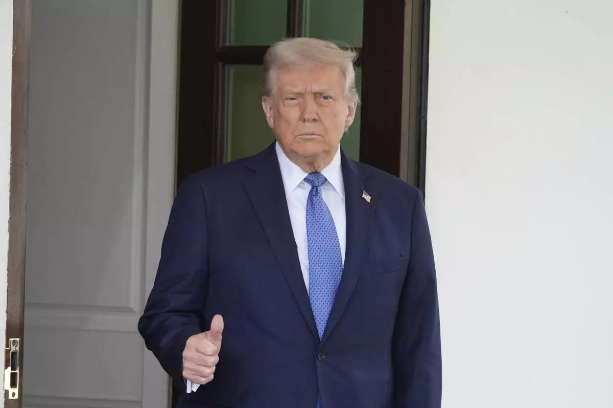 President Donald Trump walks out to greet Norwegian Prime Minister Jonas Gahr St¯re, upon his arrival at the White House, Thursday, April 24, 2025, in Washington. (AP Photo/Alex Brandon)