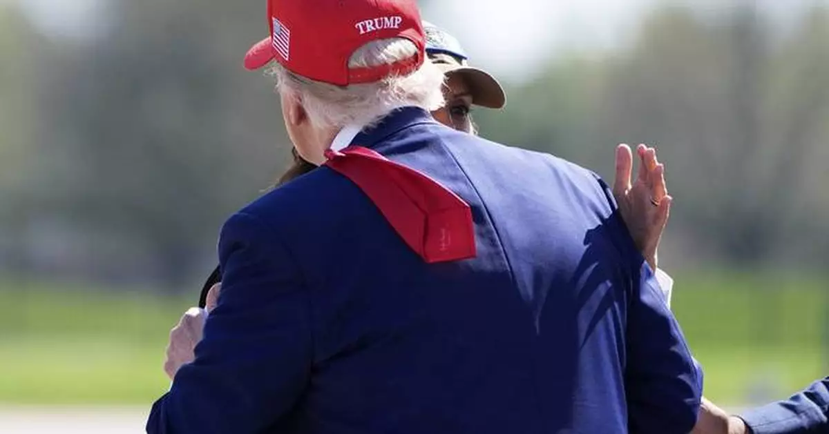 About that hug ... Whitmer risks backlash from Democrats as she embraces Trump in Michigan