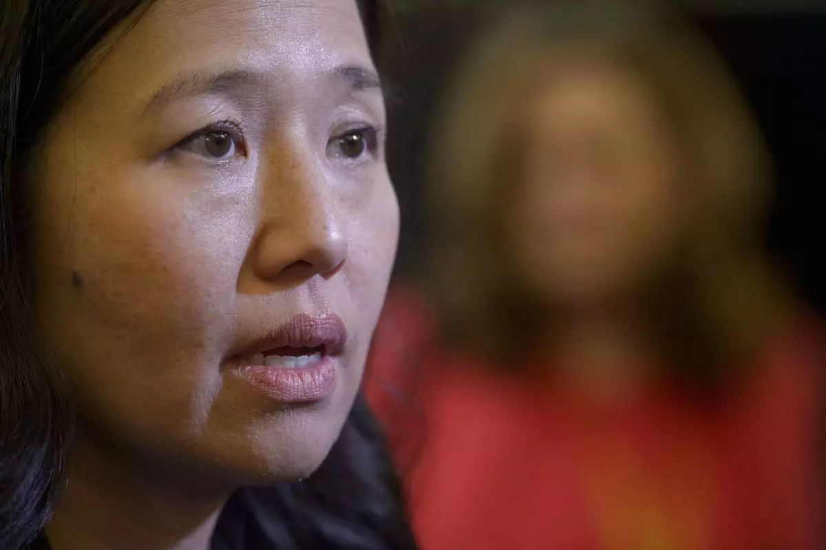 FILE - Boston Mayor Michelle Wu talks with reporters following a Massachusetts Congressional Delegation press conference March 4, 2025, in Washington. (AP Photo/Rod Lamkey, Jr., File)