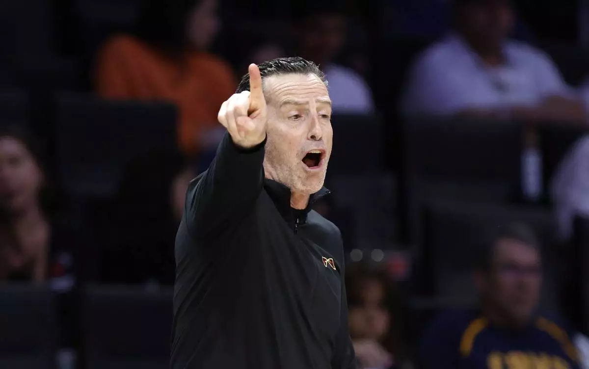 Cleveland Cavaliers head coach Kenny Atkinson reacts during the second half in Game 4 of an NBA basketball first-round playoff series against the Miami Heat, Monday, April 28, 2025, in Miami. (AP Photo/Rhona Wise)
