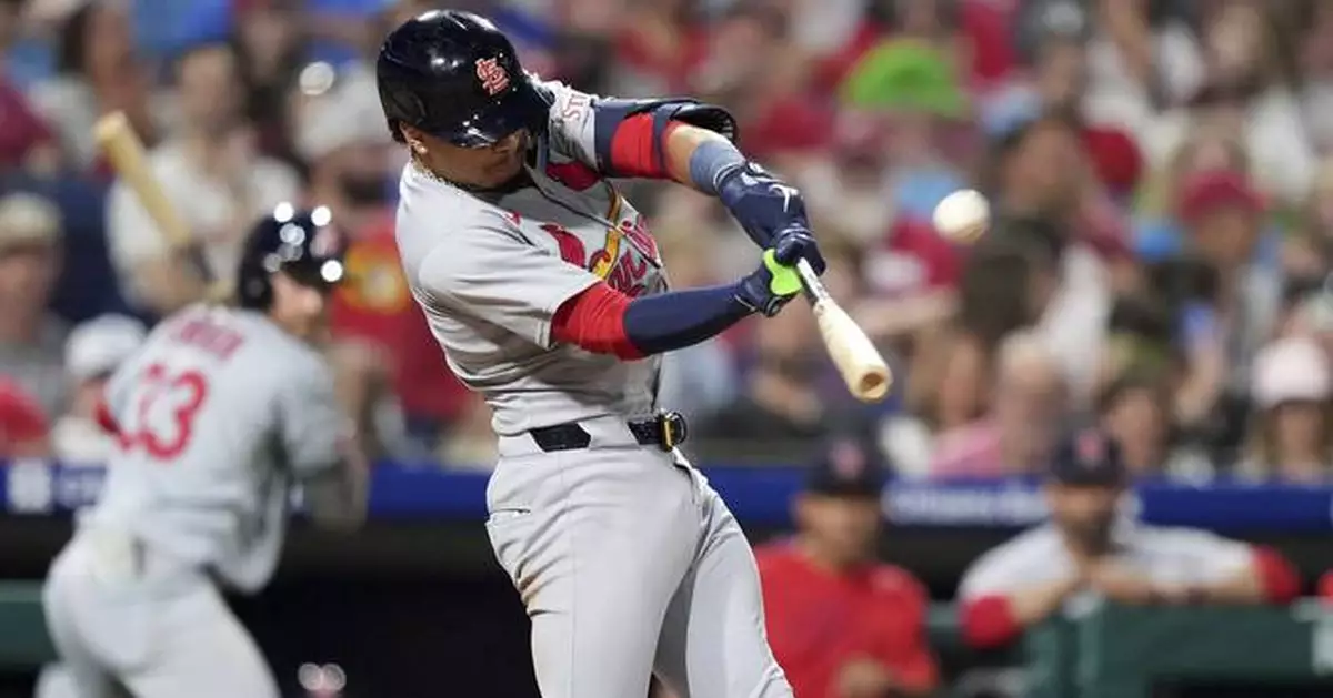 Winn homers as the Cardinals beat the Phillies 3-2 for their 9th straight win