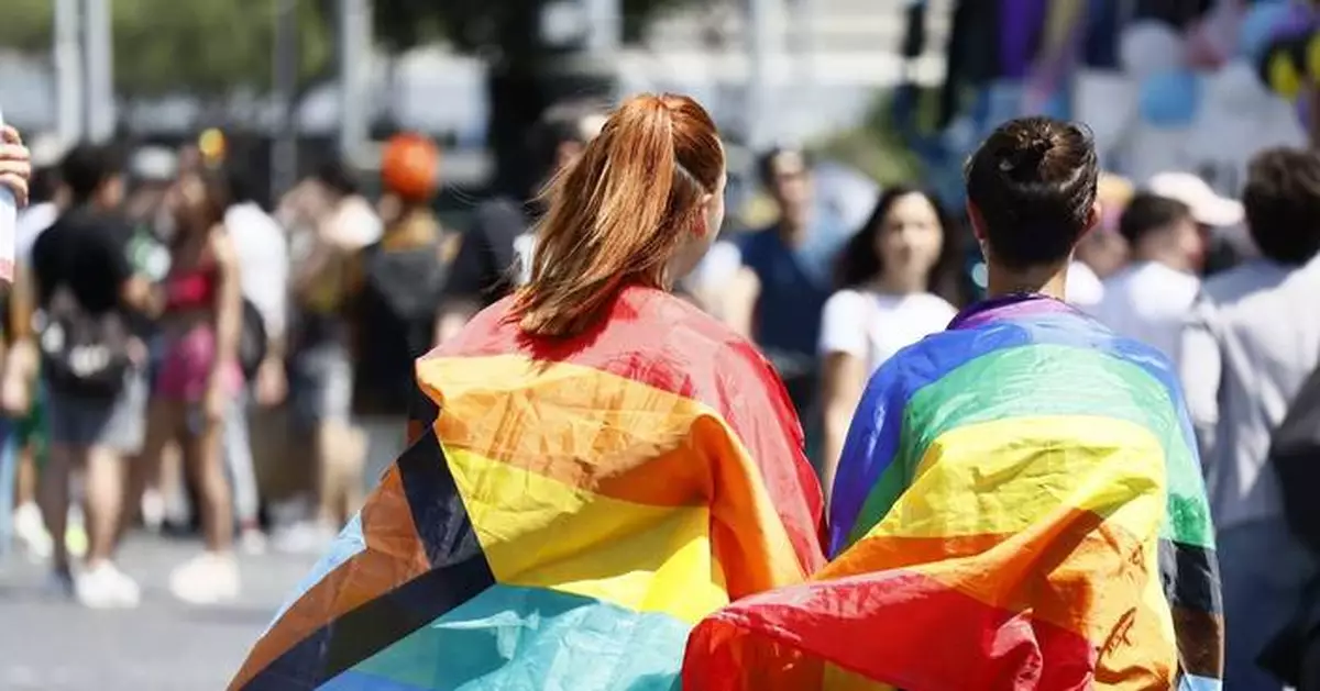 Italy's Constitutional Court says 2 mothers can register as parents on birth certificates