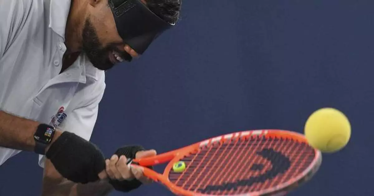 AP PHOTOS: Blind Tennis Naqi's Journey