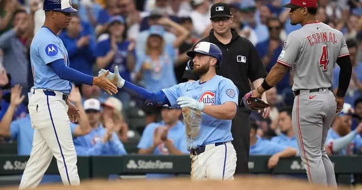 Abbott pitches 7 crisp innings as the Reds hold off the Cubs