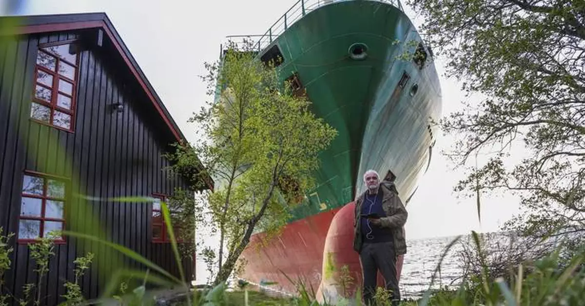 On-duty navigator was allegedly asleep when cargo ship ran aground in Norway and nearly hit a house