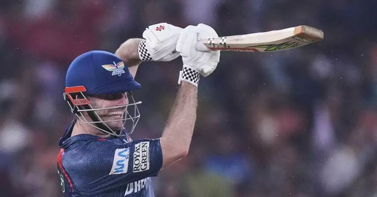Marsh's century earns Lucknow a 33-run win over IPL-leading Gujarat