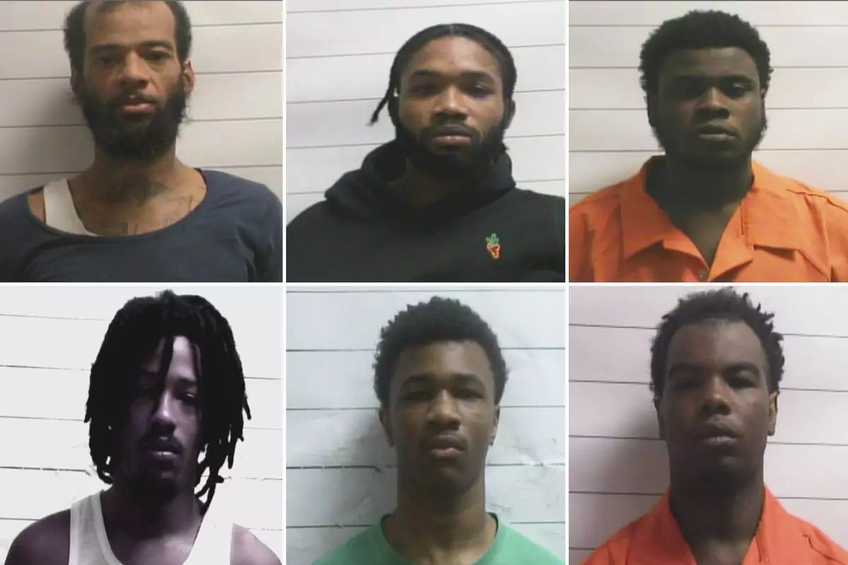 This photo combo shows inmates who escaped from a New Orleans jail, from left top: Keith A Lewis, Dkenan Dennis, Gary C Price, bottom from left, Robert Moody, Kendell Myles, Corey E Boyd. (Orleans Parish Sheriff's Office via AP)