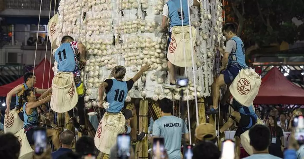 Crowds flock to celebrate the century-old Bun Festival in Hong Kong