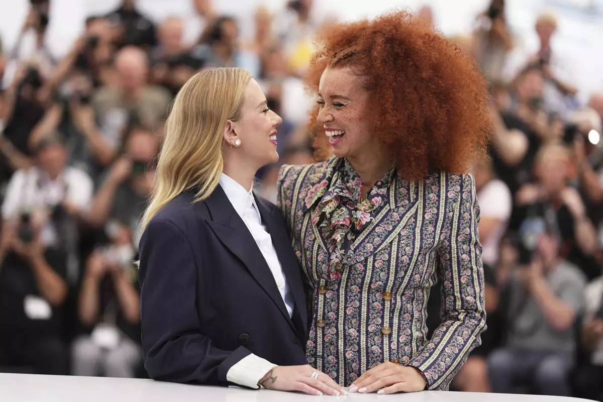 Director Scarlett Johansson, left, and Erin Kellyman pose for photographers at the photo call for the film 'Eleanor the Great' at the 78th international film festival, Cannes, southern France, Wednesday, May 21, 2025. (Photo by Scott A Garfitt/Invision/AP)
