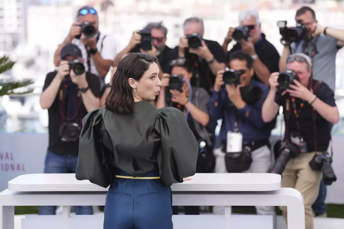 Matilda De Angelis poses for photographers at the photo call for the film 'Fuori' at the 78th international film festival, Cannes, southern France, Wednesday, May 21, 2025. (Photo by Lewis Joly/Invision/AP)