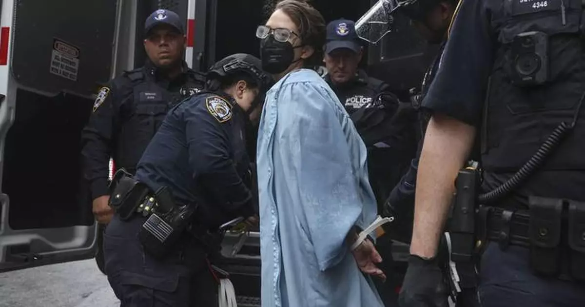 AP PHOTOS: Columbia University president notes Mahmoud Khalil's absence at graduation