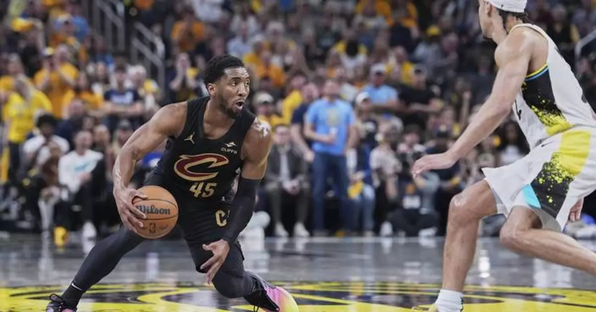 Cavs' Donovan Mitchell questionable for Tuesday's game after reaggravating sprained left ankle