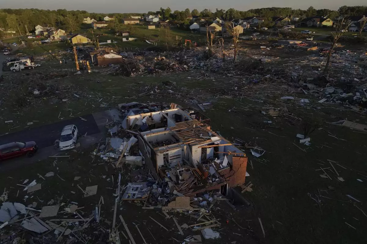 Destroyed homes are seen after a severe storm passed through the area, Saturday, May 17, 2025, in London, Ky. (AP Photo/Carolyn Kaster)