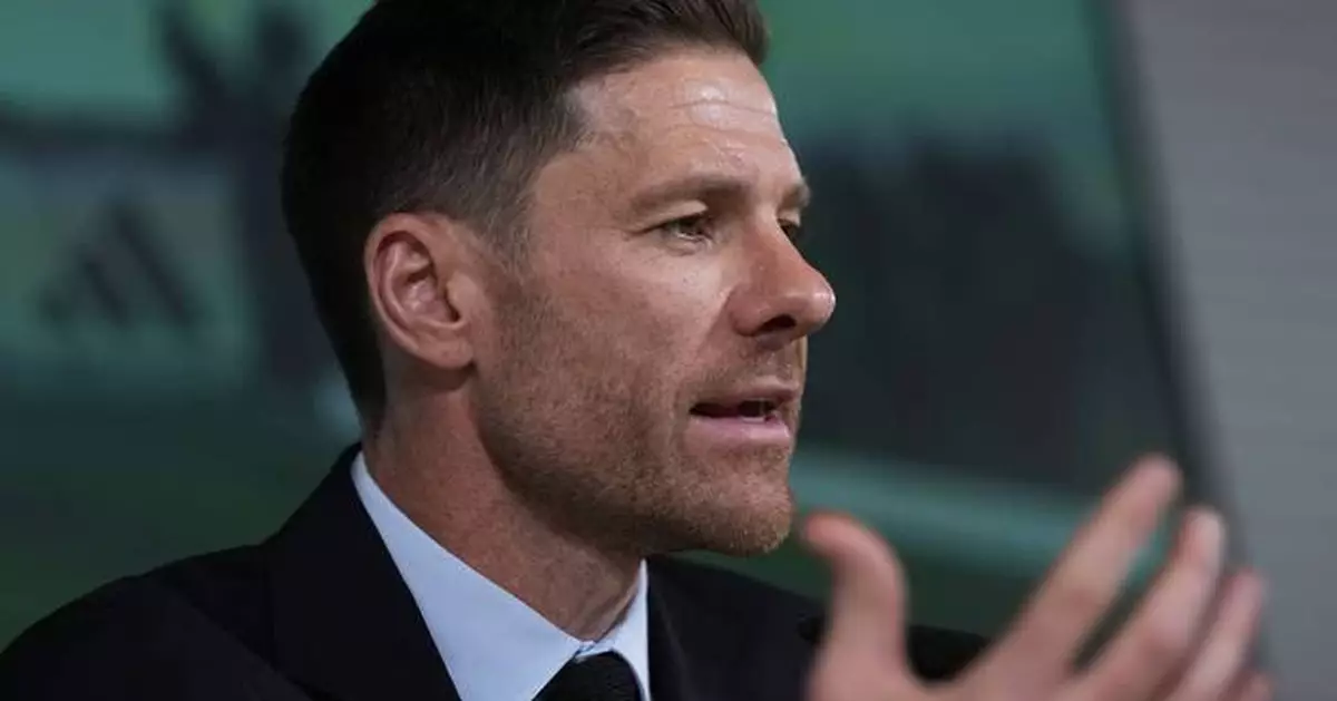 Alonso officially takes over as Real Madrid's coach and vows to follow in the footsteps of Ancelotti