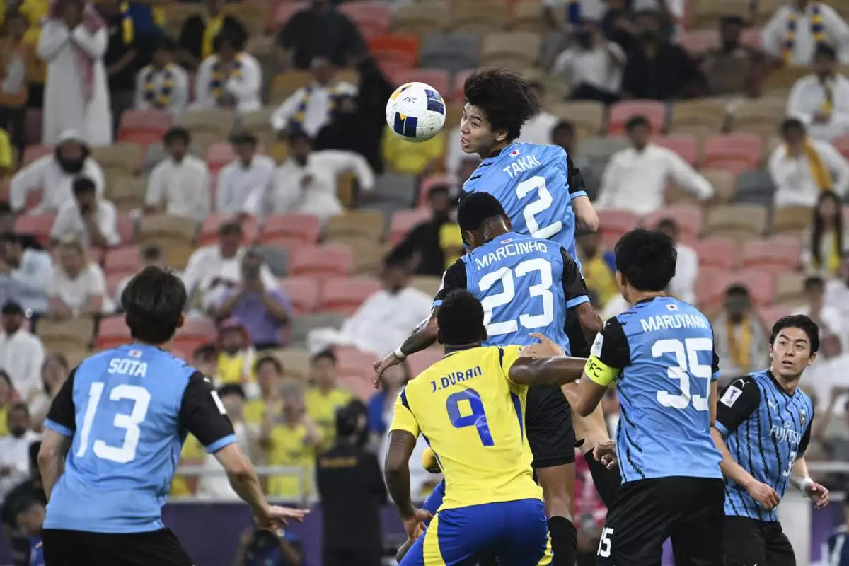 Kawasaki Frontale's Kota Takai (2) rises above to head the ball during a AFC Champions League Elite semifinal soccer match against Al Nassr at Alinma Stadium in Jeddah, Saudi Arabia, Wednesday, April 30, 2025. (AP Photo/Ali Issa)