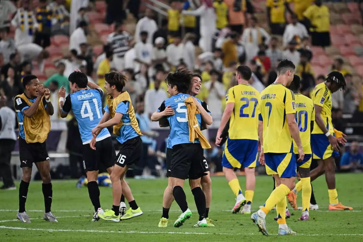 Al Nassr's Cristiano Ronaldo (7) walks off after his team lost to Kawasaki Frontale during a AFC Champions League Elite semifinal soccer match at Alinma Stadium in Jeddah, Saudi Arabia, Wednesday, April 30, 2025. (AP Photo/Ali Issa)