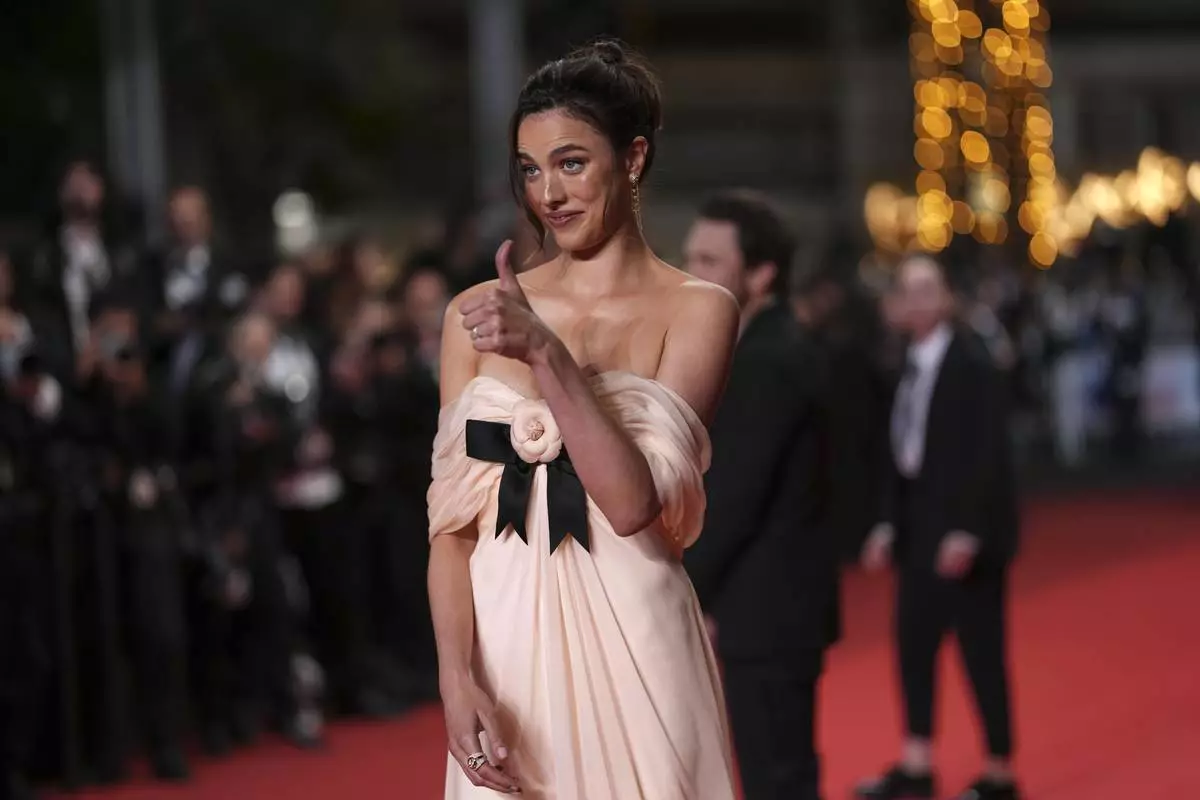 Margaret Qualley poses for photographers upon arrival at the premiere of the film 'Honey Don't!' at the 78th international film festival, Cannes, southern France, Friday, May 23, 2025. (Photo by Scott A Garfitt/Invision/AP)