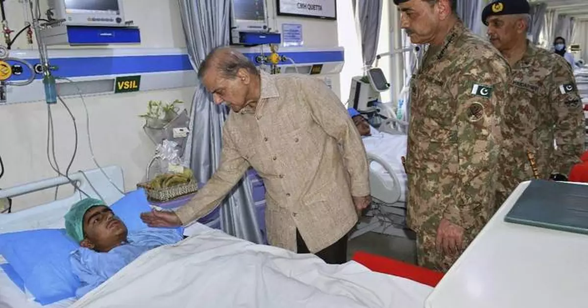 3 girls and 2 soldiers killed in Pakistan school bus bombing are buried