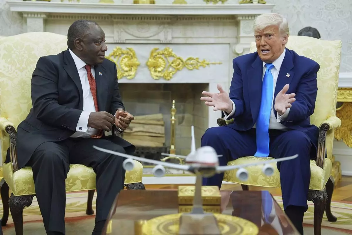 President Donald Trump meets South African President Cyril Ramaphosa in the Oval Office of the White House, Wednesday, May 21, 2025, in Washington. (AP Photo/Evan Vucci)