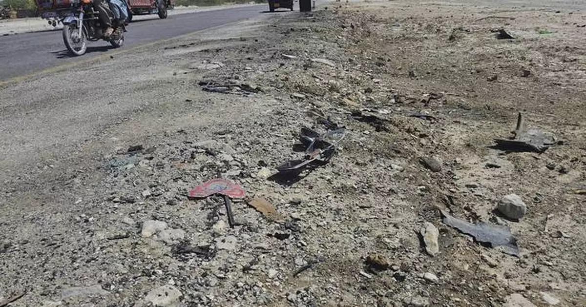 A suicide car bomber strikes a school bus in Pakistan, killing 5