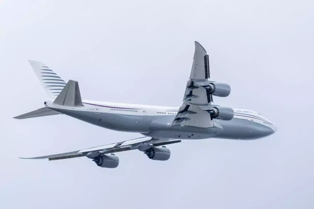 FILE - A 13-year-old private Boeing aircraft that President Donald Trump toured on Saturday to check out new hardware and technology features, and highlight the aircraft maker's delay in delivering updated versions of the Air Force One presidential aircraft, takes off from Palm Beach International Airport, Feb. 16, 2025, in West Palm Beach, Fla. (AP Photo/Ben Curtis, File)