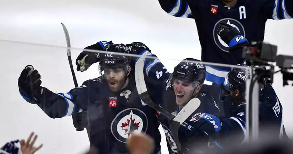 Lowry scores late in 2OT to rally Jets to 4-3 win over Blues in Game 7 to advance to 2nd round